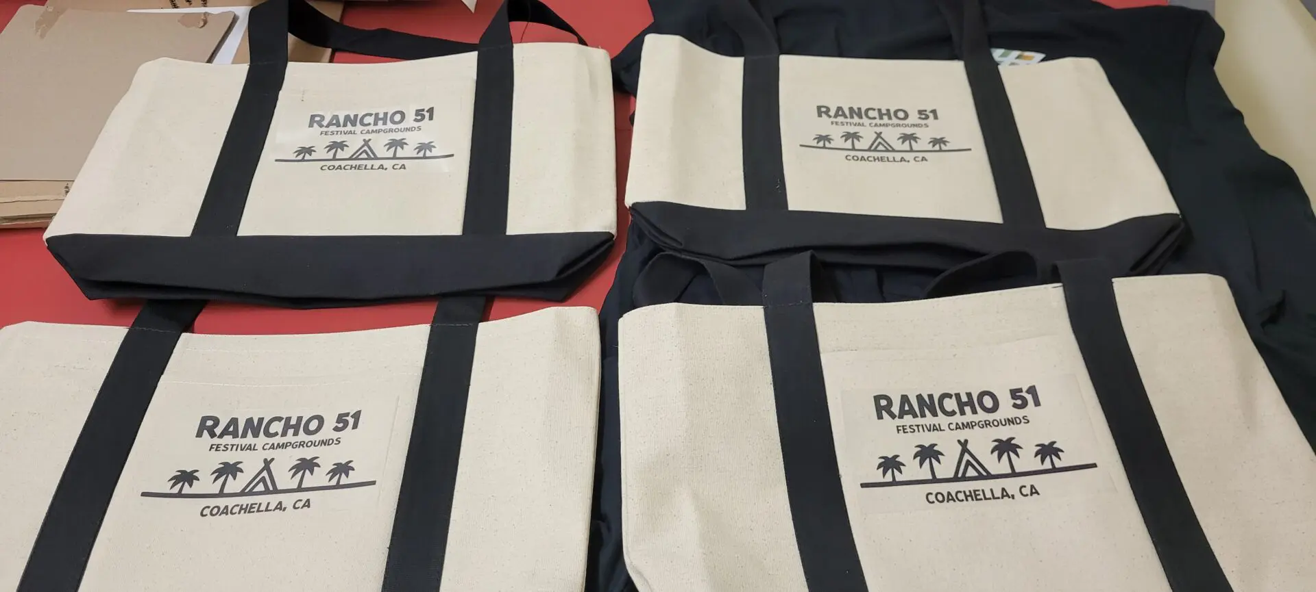 A bunch of bags written rancho 51 kept side by side